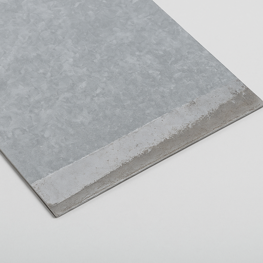 Close-up image of a steel sheet with visible signs of poor galvanization caused by under-dipping, showing uneven coating, exposed metal areas, and patchy zinc adhesion.